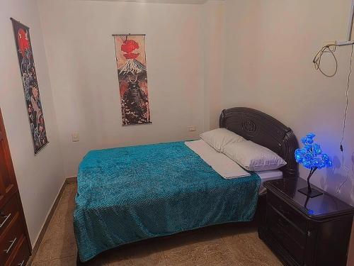 Postel nebo postele na pokoji v ubytování Apartamento Dúplex con Terraza y Jacuzzi en Aratoca