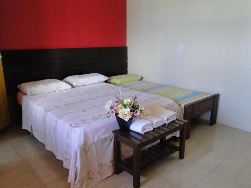 Katil atau katil-katil dalam bilik di Apartamentos da Coló