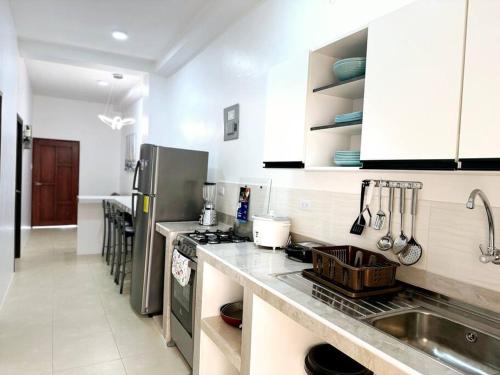 Kuchyň nebo kuchyňský kout v ubytování Bahía Mann Suite 03