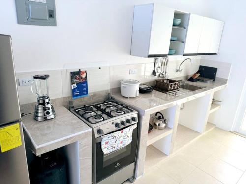 Kuchyň nebo kuchyňský kout v ubytování Bahía Mann Suite 03