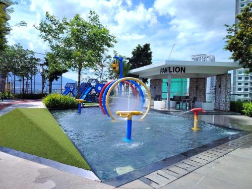 a water park with a roller coaster in the water at View of the whole Georgetown in George Town