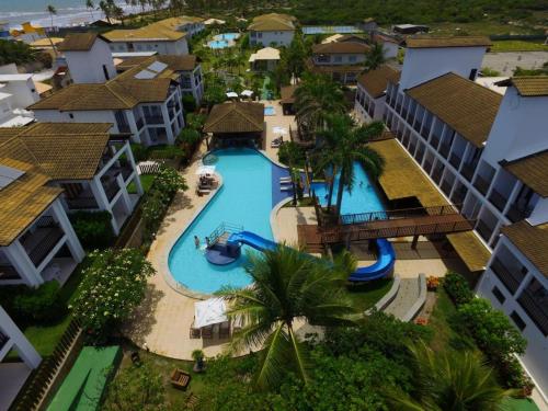 Bazén v ubytování Apartamento 03 suítes - Tree Bies Beach Resort - Praia de Subaúma nebo v jeho okolí