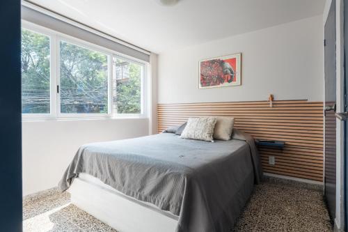 Llit o llits en una habitació de nice apt. Roma CDMX :)