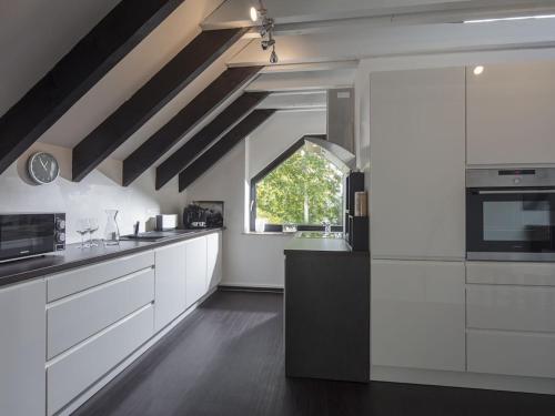 Η κουζίνα ή μικρή κουζίνα στο WK Suite Comfortable holiday residence