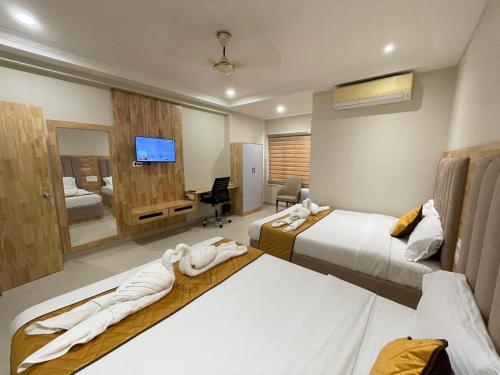 Postel nebo postele na pokoji v ubytování Hotel MGM Grand