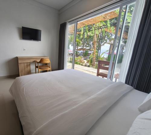 Letto o letti in una camera di Lushy Hostel Nusa Penida