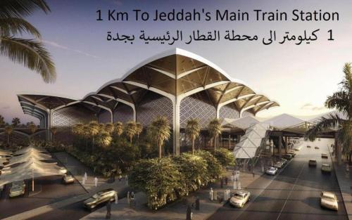 a rendering of a train station with cars parked outside at بوابة الريادة in Ar Riḩāb