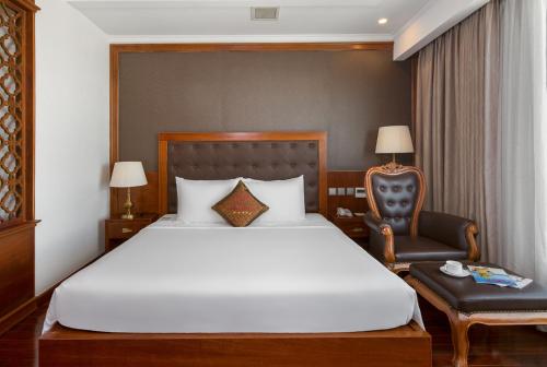 Giường trong phòng chung tại Samdi Da Nang Central Hotel
