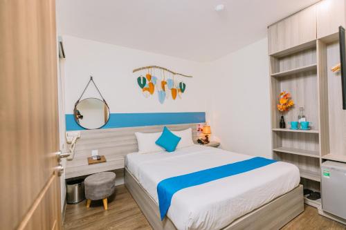 Postel nebo postele na pokoji v ubytování Tò Vò Hostel Nguyễn Công Trứ