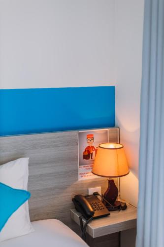 Postel nebo postele na pokoji v ubytování Tò Vò Hostel Nguyễn Công Trứ