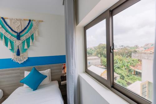 Postel nebo postele na pokoji v ubytování Tò Vò Hostel Nguyễn Công Trứ