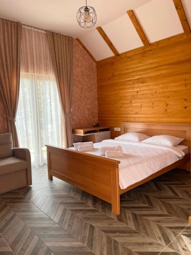 Postel nebo postele na pokoji v ubytování Etno selo Tačevine