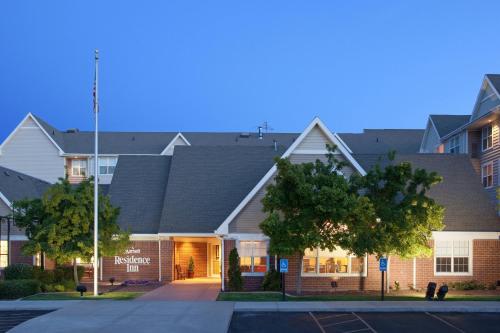 a building at night with lights on at Residence Inn Salt Lake City Airport in Salt Lake City