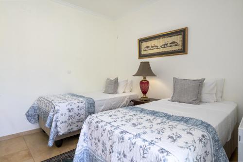 Postel nebo postele na pokoji v ubytování Casa Olympia