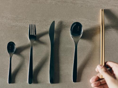 a group of utensils sitting on top of a table at illi Gran Azabujuban in Tokyo