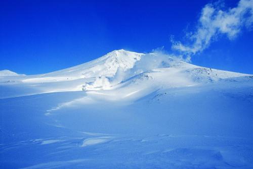 a mountain covered in snow on a clear day at La Vista Daisetsuzan in Higashikawa