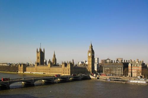 a city with a bridge and the big ben clock tower at London Marriott Hotel County Hall in London
