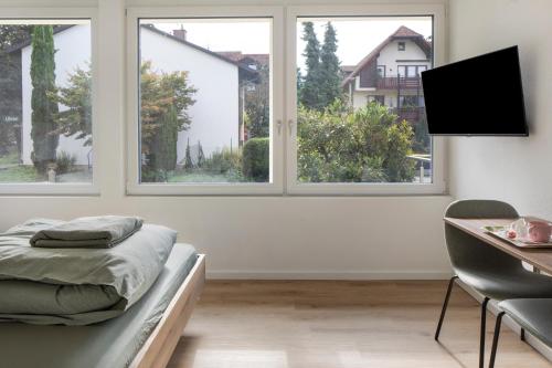 TV a/nebo společenská místnost v ubytování Mcello Apartments
