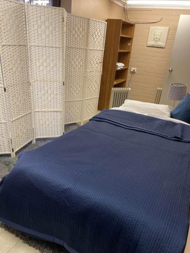 Ένα ή περισσότερα κρεβάτια σε δωμάτιο στο Felicity peaceful home stay