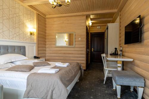 MARION SPA Hotel & Spa - RENOVATION - Rooms, SPA area, Swimming pool, Reception, Restaurant, Lounge Bar, Hookah bar, Children's room, Parking, SPA and Breakfast included in the priceにあるベッド