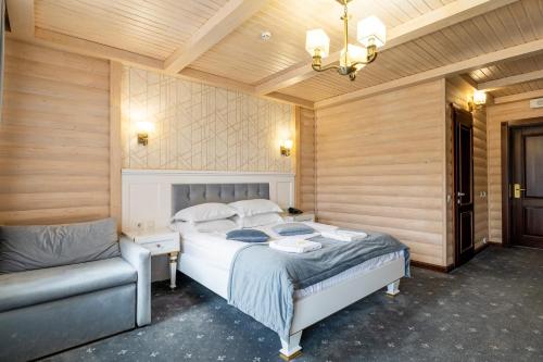 MARION SPA Hotel & Spa - RENOVATION - Rooms, SPA area, Swimming pool, Reception, Restaurant, Lounge Bar, Hookah bar, Children's room, Parking, SPA and Breakfast included in the priceにあるベッド