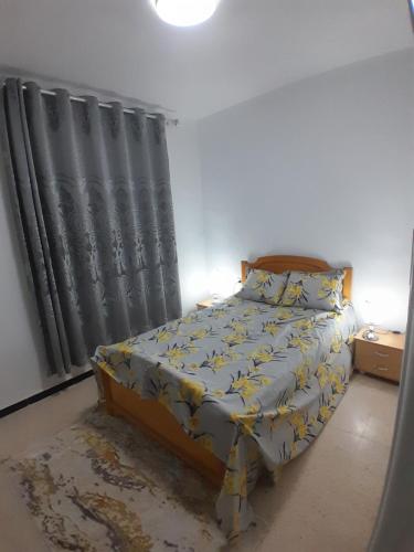 Postel nebo postele na pokoji v ubytování Dar Bhar nouvel appartement