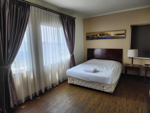 Ένα ή περισσότερα κρεβάτια σε δωμάτιο στο Hunian dekat T I Ancol, pintu Toll, Itc Mangga dua