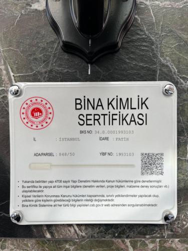 a sign that reads zinc kleiniki serifiskiskiskiskiskisk at Espoir HOTEL in Istanbul