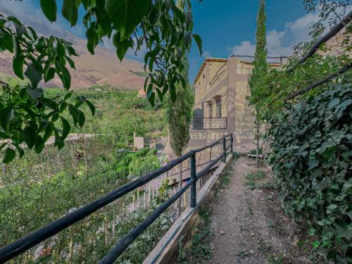 a house with a fence in front of it at Tonaroz House in Imlil