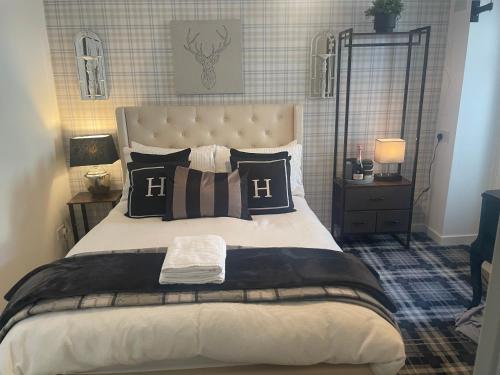Un ou plusieurs lits dans un hébergement de l'établissement Harbour Inn