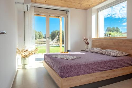 Katil atau katil-katil dalam bilik di Petra Serenity Villas