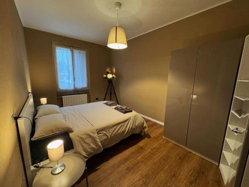 Postel nebo postele na pokoji v ubytování Vittorio Home