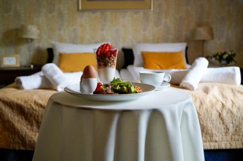 Postel nebo postele na pokoji v ubytování American House Baletowa