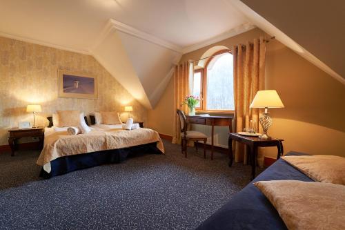 Postel nebo postele na pokoji v ubytování American House Baletowa