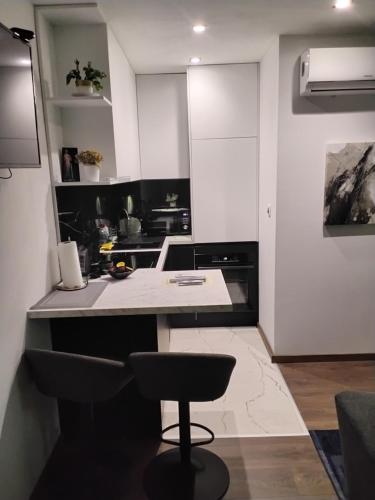 Kuchyň nebo kuchyňský kout v ubytování Niko