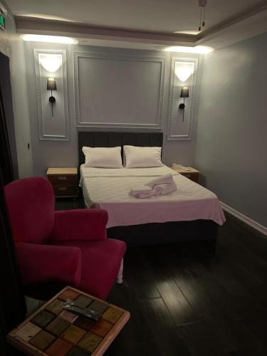 Katil atau katil-katil dalam bilik di Kıyı Butik Otel