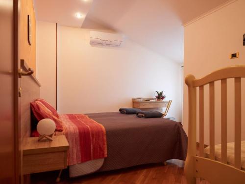 Ένα ή περισσότερα κρεβάτια σε δωμάτιο στο BnB Anna e Leo - Casa di Leo