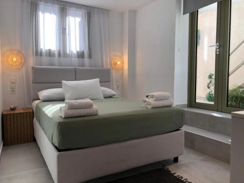 Ένα ή περισσότερα κρεβάτια σε δωμάτιο στο Olive green house