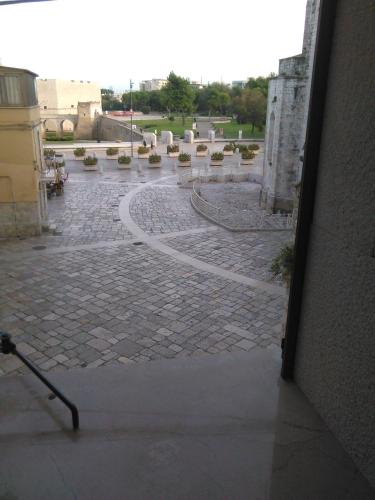 a view from a window of a courtyard at B&B Il Campanile in Barletta