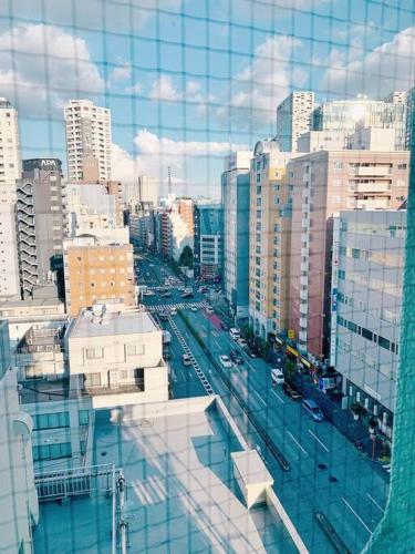 Shinjuku Kabuki Youth Hostel#New Sunshine Room#50 second walk from Higashi Shinjuku subway#Automatic locking door at entrance#新宿12BK