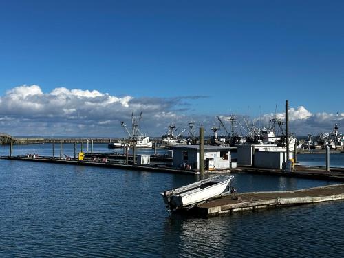 a boat docked at a dock in the water at Dock Street Inn in Westport