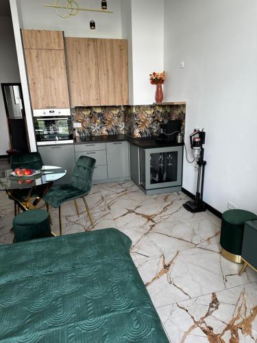 Kuchyň nebo kuchyňský kout v ubytování Apartament nad samym morzem 11p