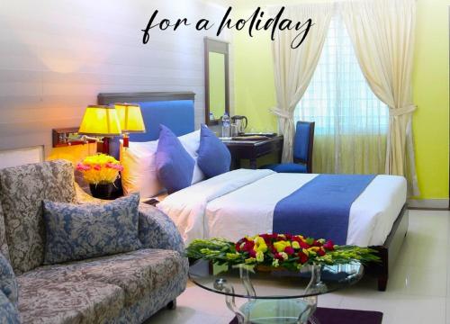 Una cama o camas en una habitación de Hotel Valley Garden - Sylhet