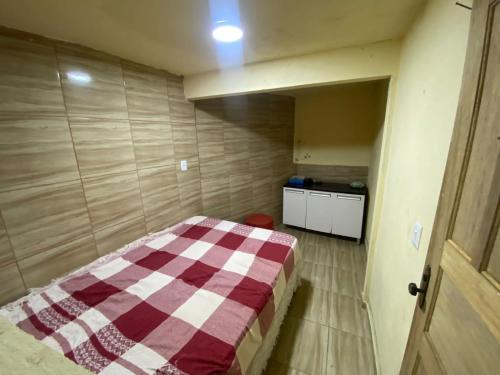 Ένα ή περισσότερα κρεβάτια σε δωμάτιο στο Casa Itacaré 1