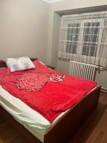 Postel nebo postele na pokoji v ubytování Prishtina