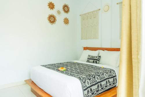 Кровать или кровати в номере Amalla Lodge Penida by Omanera