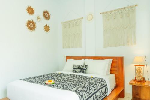 Кровать или кровати в номере Amalla Lodge Penida by Omanera