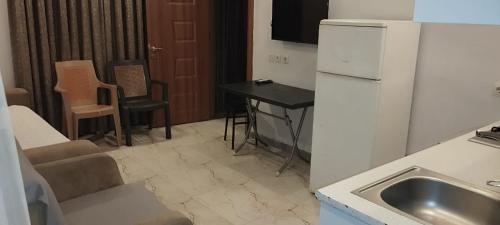 Kuchyň nebo kuchyňský kout v ubytování new batumi sela1