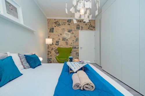 Кровать или кровати в номере Vintage Gem - 8 min Duomo