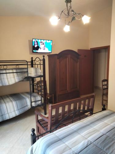 Postel nebo postele na pokoji v ubytování THE BEST ROOMS & APARTMENTS - Parcheggia gratis sotto casa ed entra -
